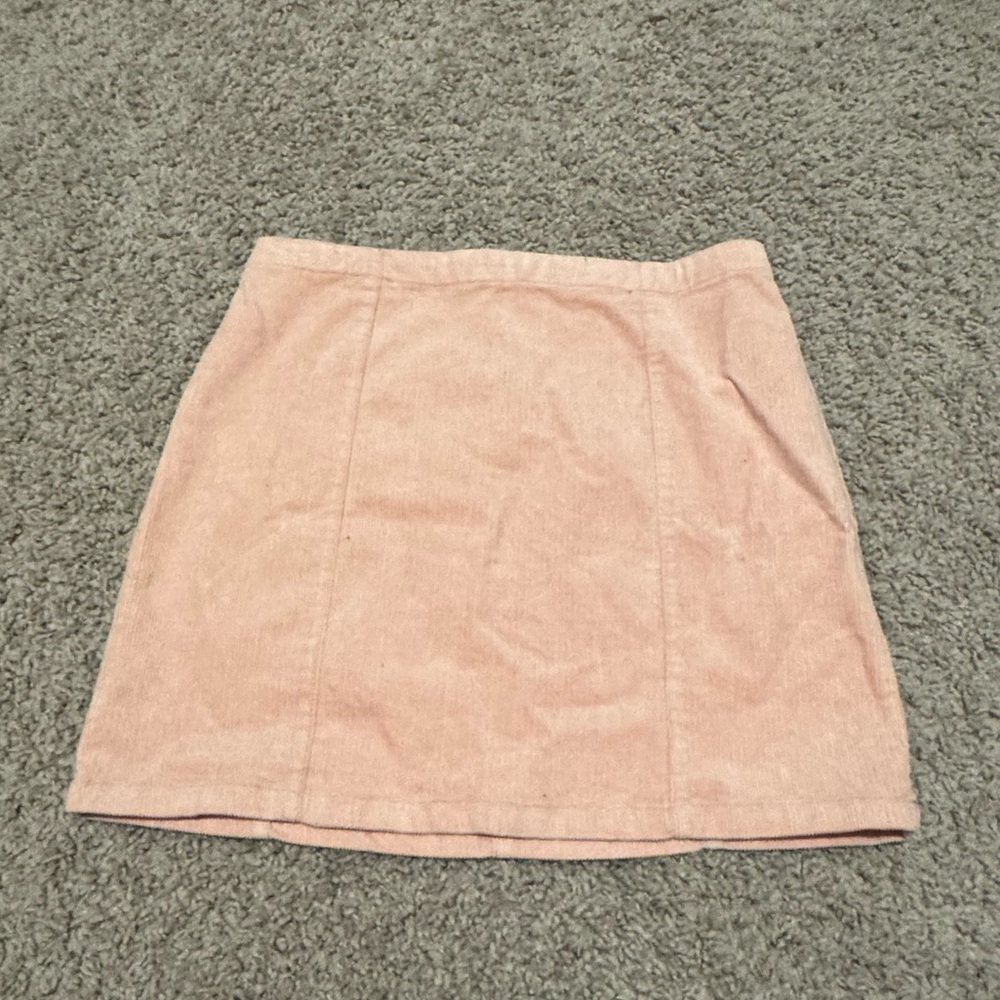 Pale pink zip up mini skirt